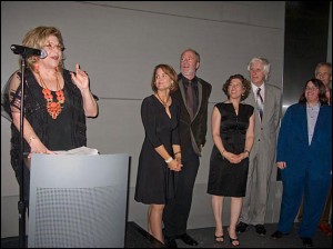 Founder Wallis Annenberg speaks at the inaugural opening while exhibiting photographers, Carolyn Cole, Greg Gorman, Lauren Greenfield, Douglas Kirkland and Catherine Opie, look on. Courtesy, © Susan Katz, 2009