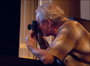 LOOK3 pioneer, Michael “Nick” Nichols documents a fellow photographer on stage. Courtesy, © Susan Katz, 2011