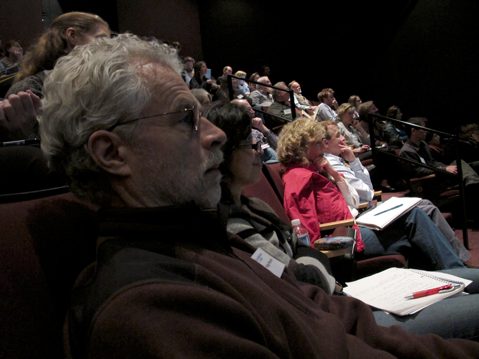 Participants watch on during Benjamin Drummond &amp; Sara Joy Steele&#39;s presentation. Courtesy, © Suzie Katz 2012. - The-audience-at-Collaborations-for-Cause_8121