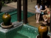 Foundry Instructor Andrea Bruce works with a student poolside in Chiang Mai. Courtesy, © Suzie Katz 2012